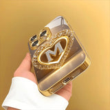 Sparkling Heart Letter M Metallic Glass Phone Case for iPhone 17, 16, 15, 14, 13, 12, 11 Pro Max, Plus, 17 Air, 16E Cover