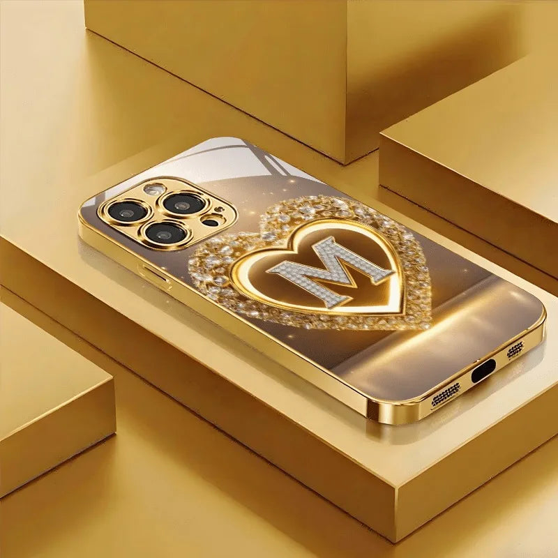 Sparkling Heart Letter M Metallic Glass Phone Case for iPhone 17, 16, 15, 14, 13, 12, 11 Pro Max, Plus, 17 Air, 16E Cover