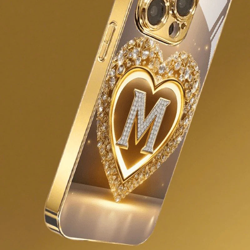 Sparkling Heart Letter M Metallic Glass Phone Case for iPhone 17, 16, 15, 14, 13, 12, 11 Pro Max, Plus, 17 Air, 16E Cover