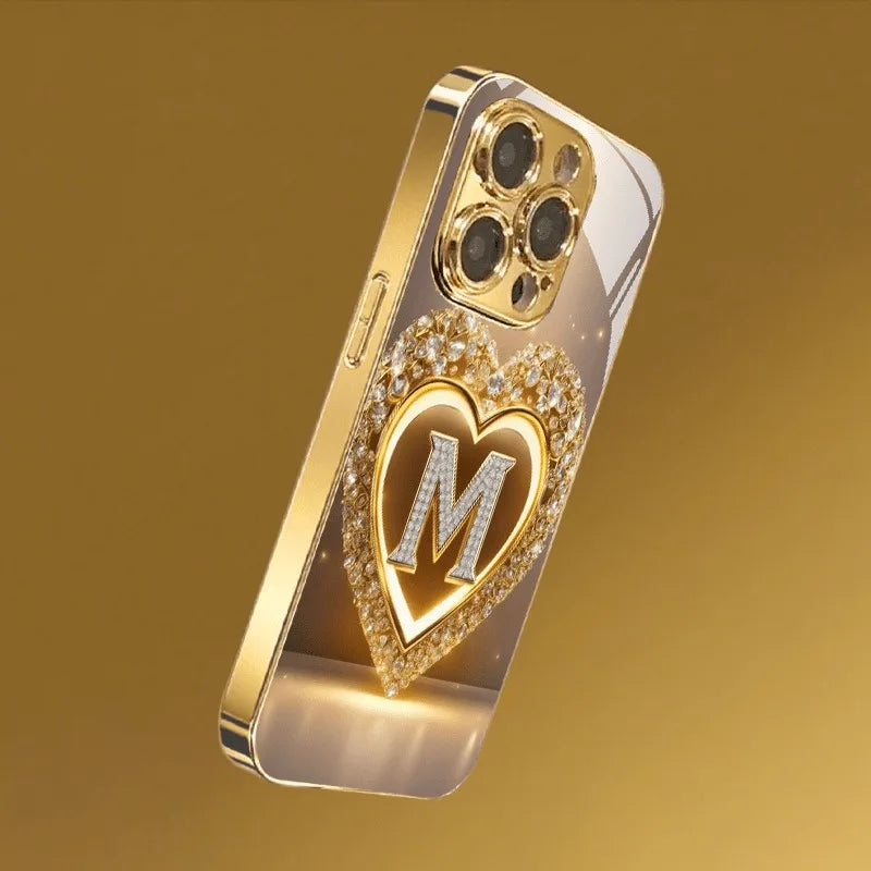 Sparkling Heart Letter M Metallic Glass Phone Case for iPhone 17, 16, 15, 14, 13, 12, 11 Pro Max, Plus, 17 Air, 16E Cover